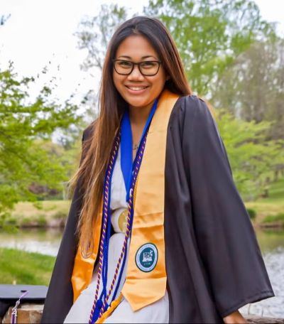 Amanda in graduation gown