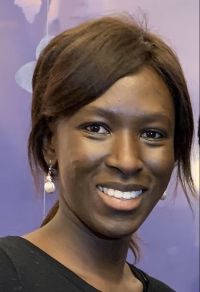 headshot of Oumi Ba Livingston