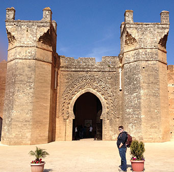 Lianne poses in front of the Chellah in Rabat, Morocco on one of her many excursions outside Meknes during her Capstone year.