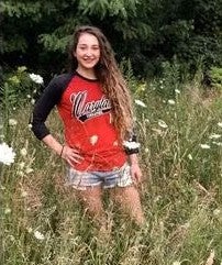 woman in wild flower fields