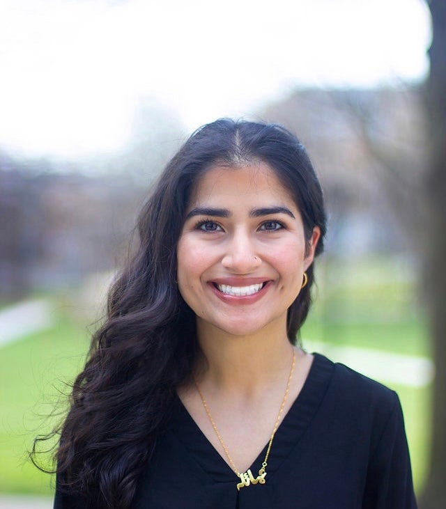 Young woman smiling with a blurred background