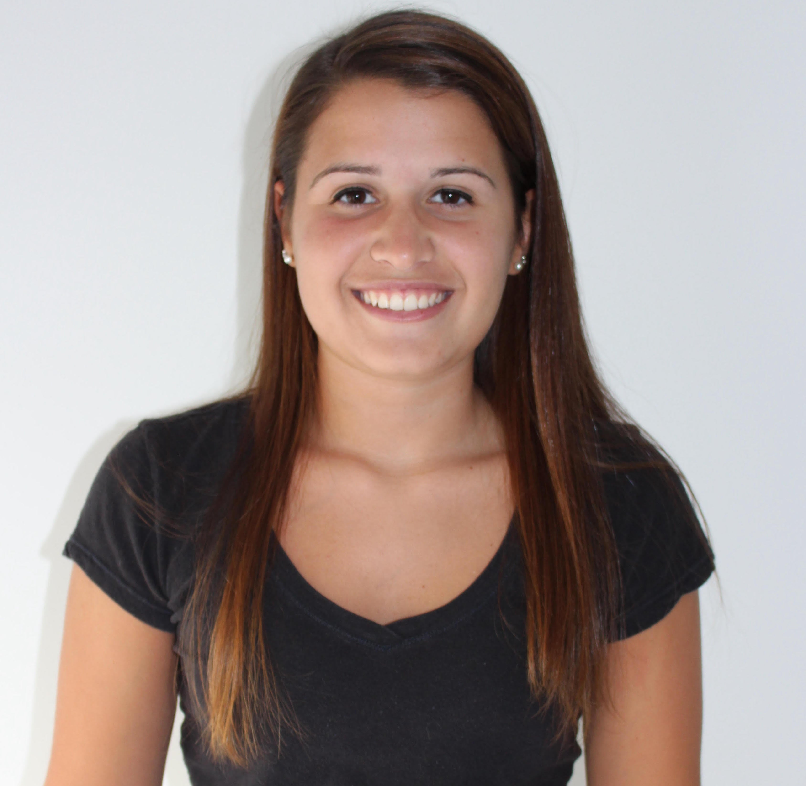 Young woman smiling and wearing a t-shirt