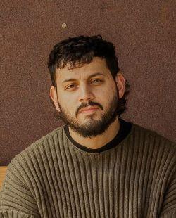 headshot of Christopher Torres