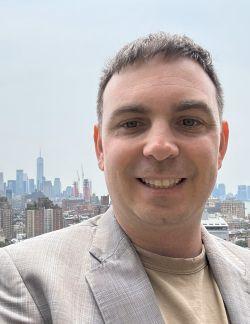 headshot of Eric