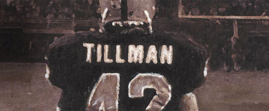 Grainy monochrome photograph of Tillman in football gear from behind. The top of the shirt reads "Tillman" and under the number is "42"