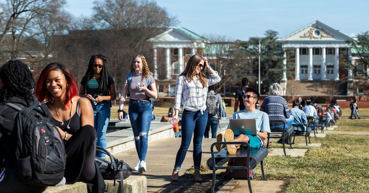 Students outdoors on the Mall on an unseasonably warm February day.