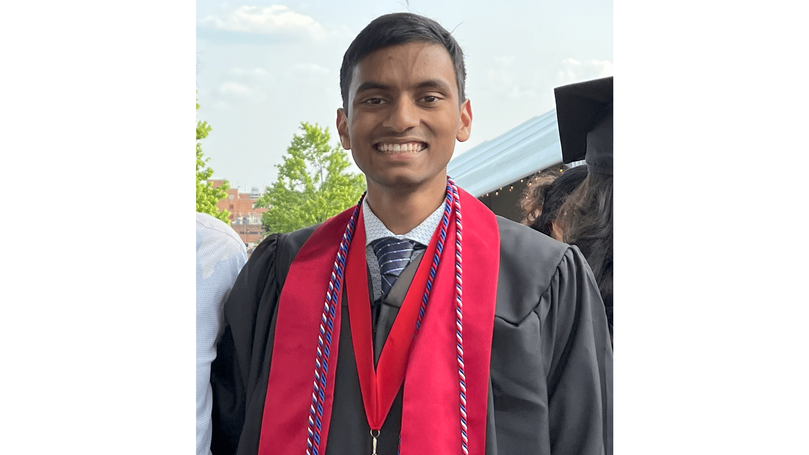 Photo of Shiva Vijayaverl in commencement regalia.