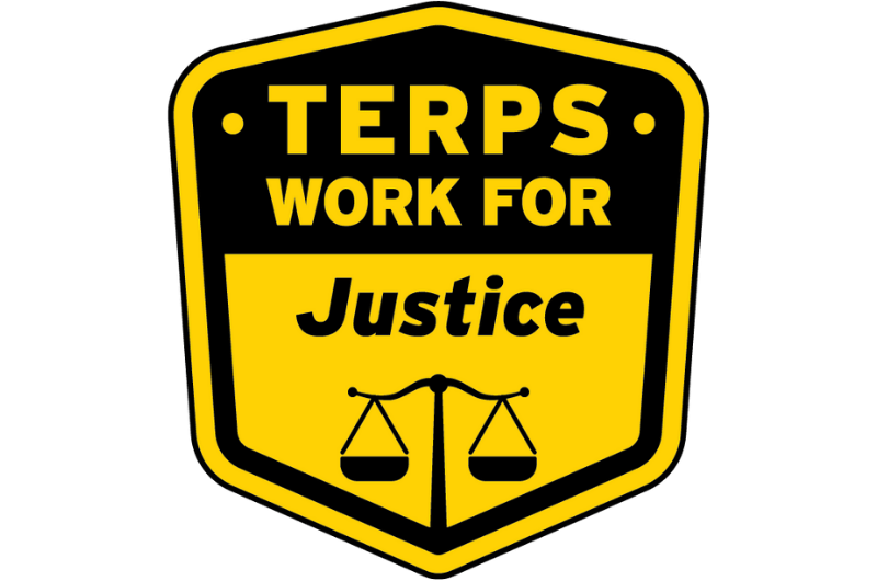 Terps Work for Justice text on yellow and black badge.